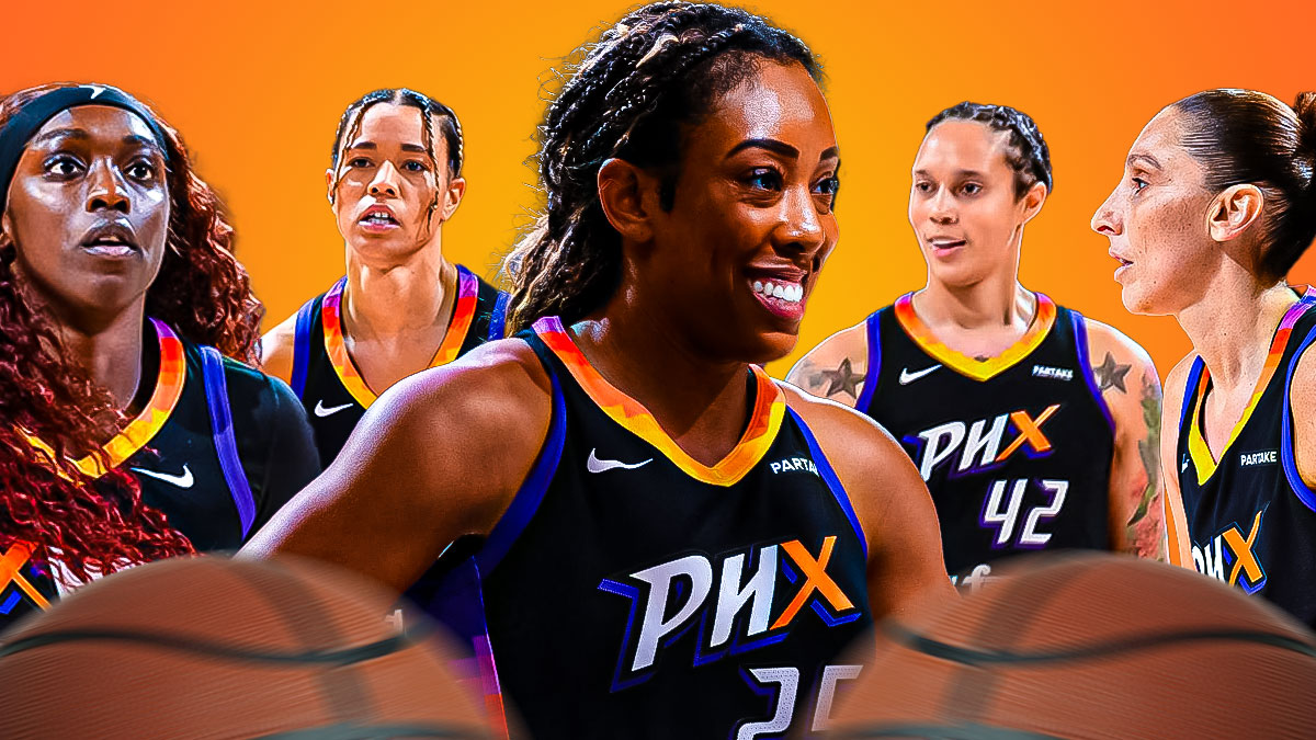 Mercury's Monique Billings hyped up, clapping her hands, beside Brittney Griner, Diana Taurasi, Natasha Cloud and Kahleah Copper