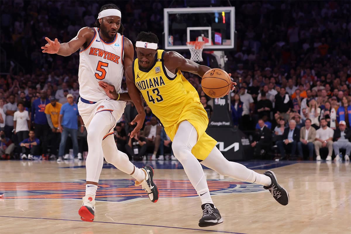 Indiana Pacers forward Pascal Siakam (43) drives to the basket against New York Knicks forward Precious Achiuwa (5) during the second quarter of game seven of the second round of the 2024 NBA playoffs at Madison Square Garden.