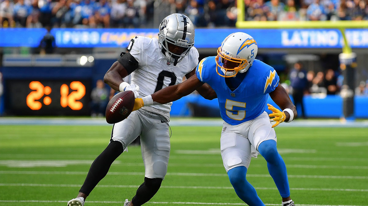 Las Vegas Raiders cornerback Jakorian Bennett (0) blocks a pass intended for Los Angeles Chargers wide receiver Joshua Palmer (5) during the second half at SoFi Stadium