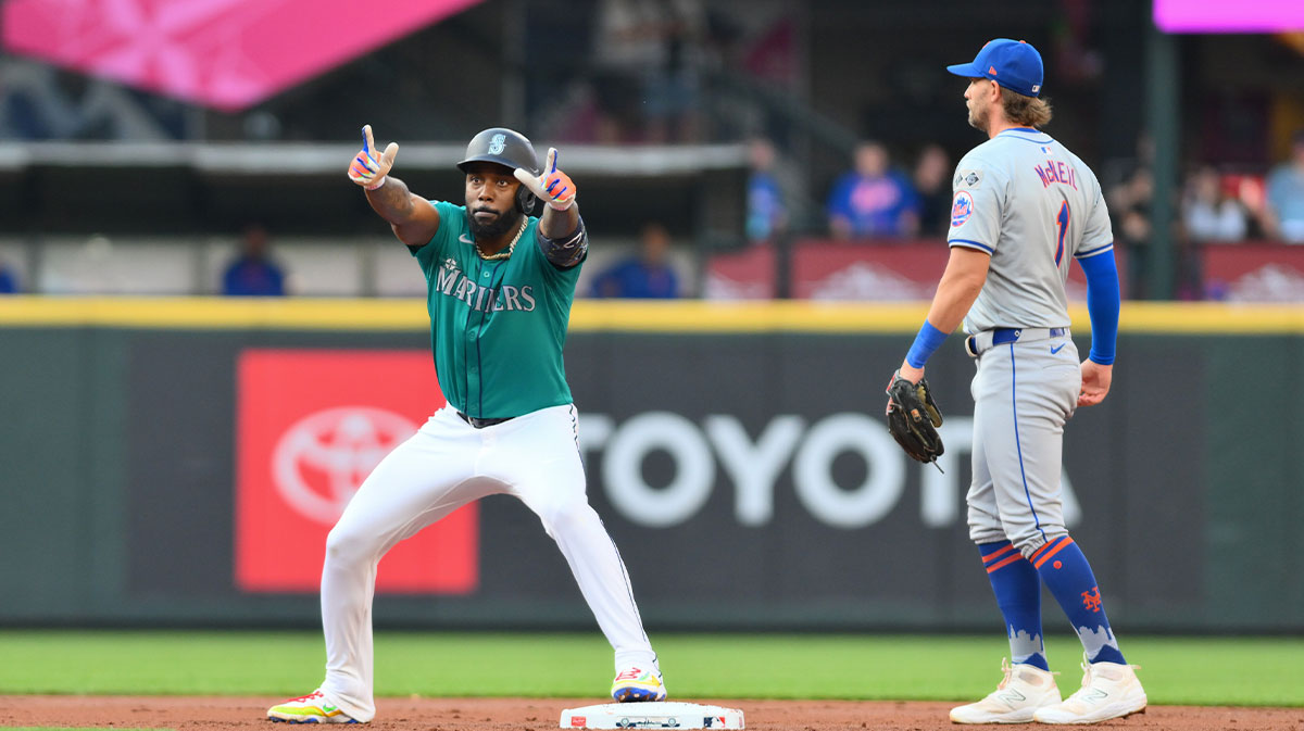 eattle Mariners left fielder Randy Arozarena (56) celebrates after hitting an RBI double against the New York Mets during the first inning at T-Mobile Park.