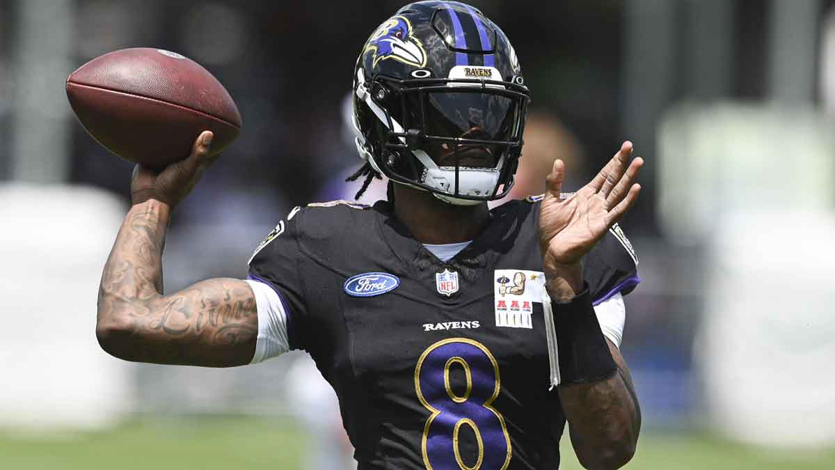 Jul 27, 2024; Owings Mill , MD, USA; Ravens quarterback Lamar Jackson (8) lthrows during the afternoon session of training camp at the Under Armour Performance Center, Mandatory Credit: Tommy Gilligan-USA TODAY Sports