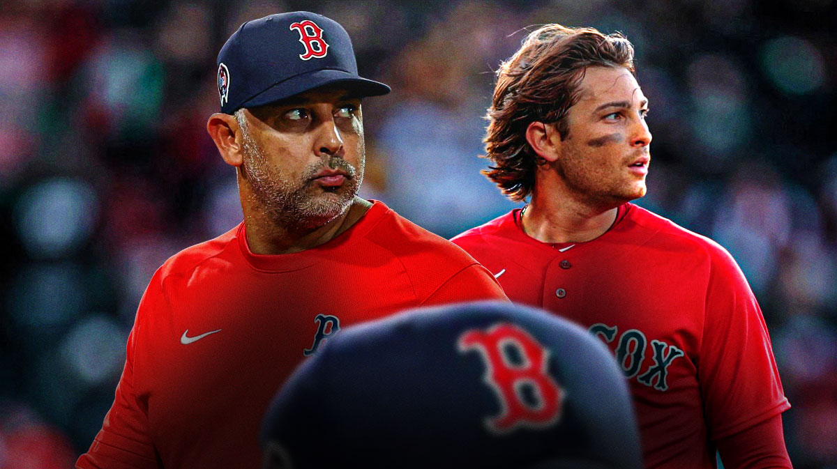 Boston Red Sox manager Alex Cora and star Triston Casas in front of Fenway Park.