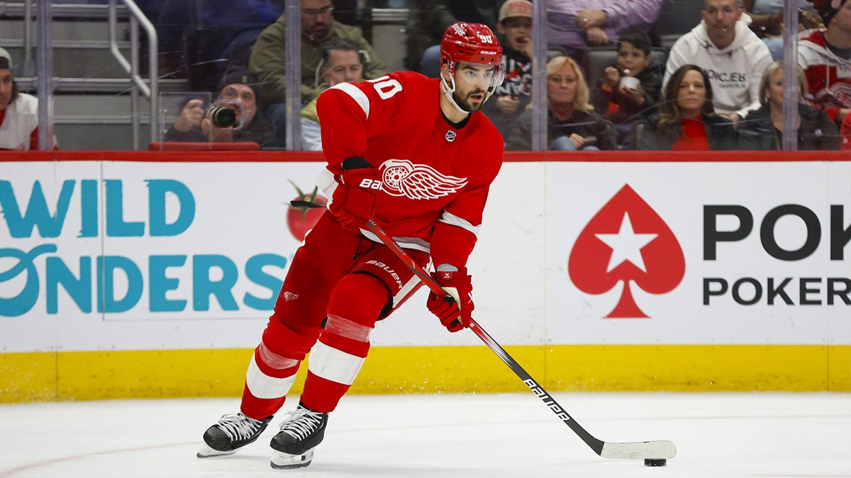 Detroit Red Wings center Joe Veleno (90) handles the puck during the third period at Little Caesars Arena.