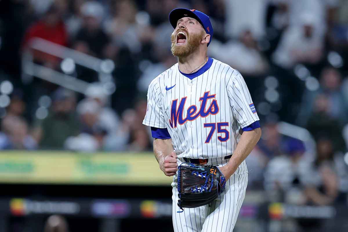 New York Mets relief pitcher Reed Garrett (75) reacts after getting the final out against the New York Yankees at Citi Field.