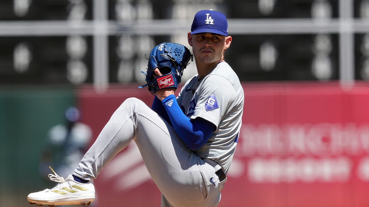  Los Angeles Dodgers starting pitcher River Ryan (77) throws a pitch against the Oakland Athletics during the fourth inning at Oakland-Alameda County Coliseum.