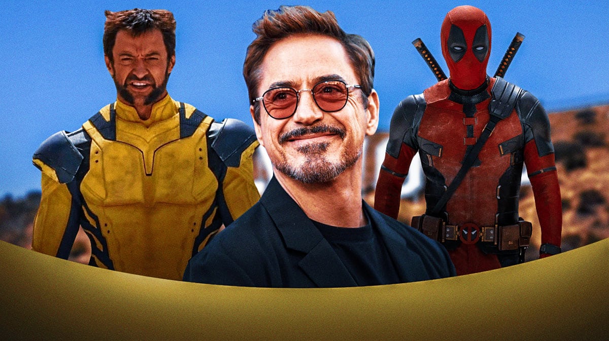 Marvel star Robert Downey Jr with Wolverine (Hugh Jackman) and Deadpool (Ryan Reynolds).