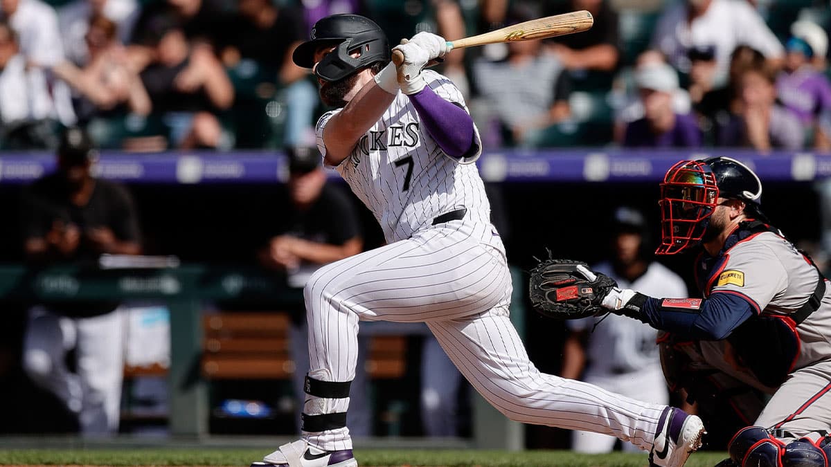 Colorado Rockies second baseman Brendan Rodgers (7) hits a two RBI double in the eighth inning against the Atlanta Braves at Coors Field. 