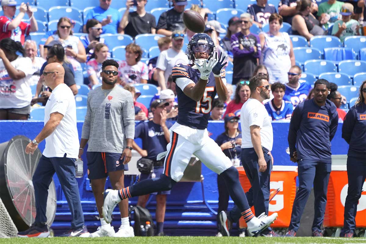  Chicago Bears wide receiver Rome Odunze (15) warms up prior to the game against the Buffalo Bills at Highmark Stadium.