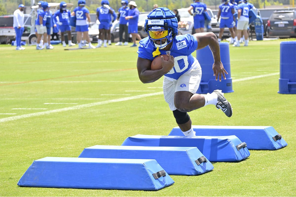 May 28, 2024; Thousand Oaks, CA, USA; Los Angeles Rams running back Ronnie Rivers (20) participates in drills during OTAs at the team training facility at California Lutheran University. Mandatory Credit: Jayne Kamin-Oncea-USA TODAY Sports