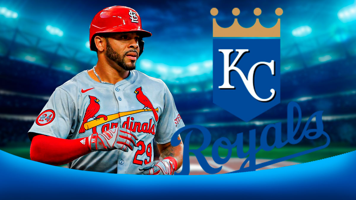 Royals new outfielder Tommy Pham next to the Royals logo with the stadium in the background