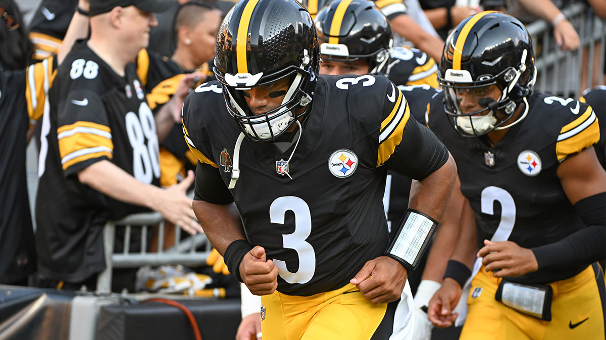 Pittsburgh Steelers quarterback Russell Wilson (3) and Justin Fields (2) take the field for pre-game against the Houston Texans at Acrisure Stadium.