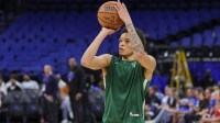 Milwaukee Bucks guard Ryan Rollins (55) warms up before the game against the Orlando Magic at KIA Center.