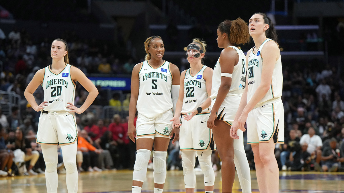 Liberty guard Sabrina Ionescu (20), forward Kayla Thornton (5), guard Courtney Vandersloot (22), forward Nyara Sabally (8) and forward Breanna Stewart (30) react in the second half against the LA Sparks at Crypto.com Arena.