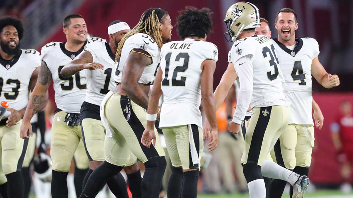 New Orleans Saints players celebrate after kicker Charlie Smyth (39) kicked the game-winning field goal during a preseason game on Aug. 10, 2024 at State Farm Stadium in Glendale.