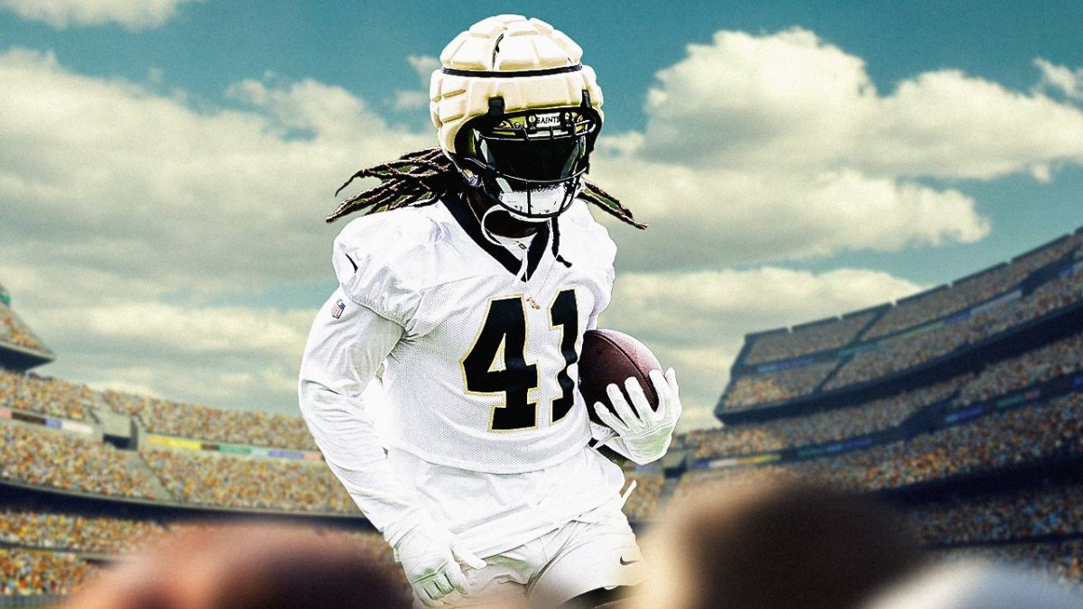 Alvin Kamara smiles in Saints gear