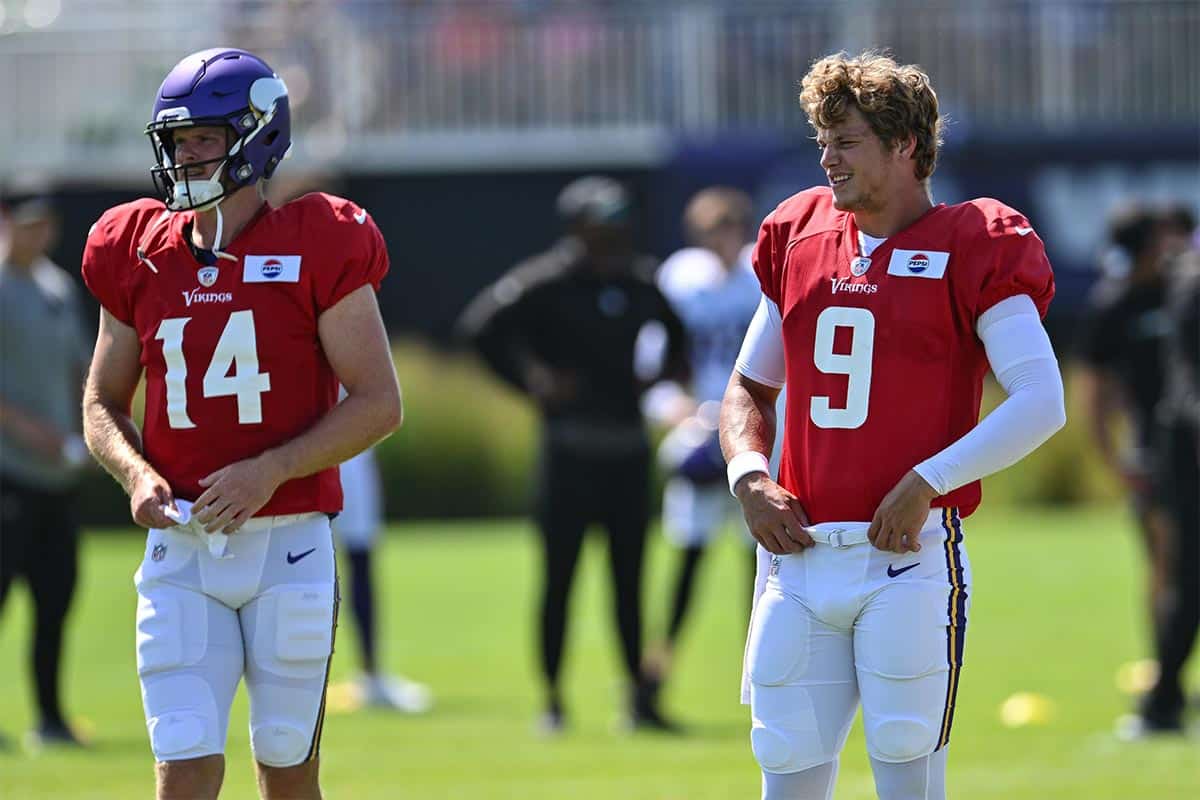 Minnesota Vikings quarterback J.J. McCarthy (9) and quarterback Sam Darnold (14) warm up during practice at Vikings training camp in Eagan, MN.