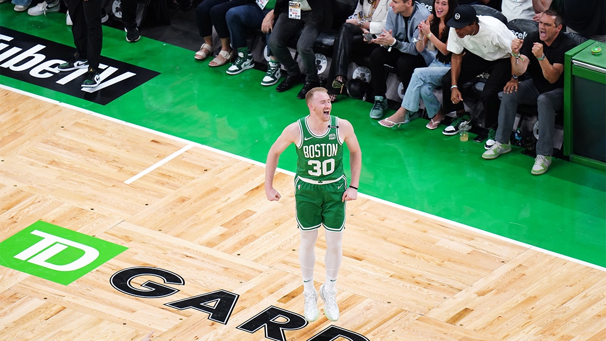 Sam Hauser (30) reacts after a three point shot in the first quarter