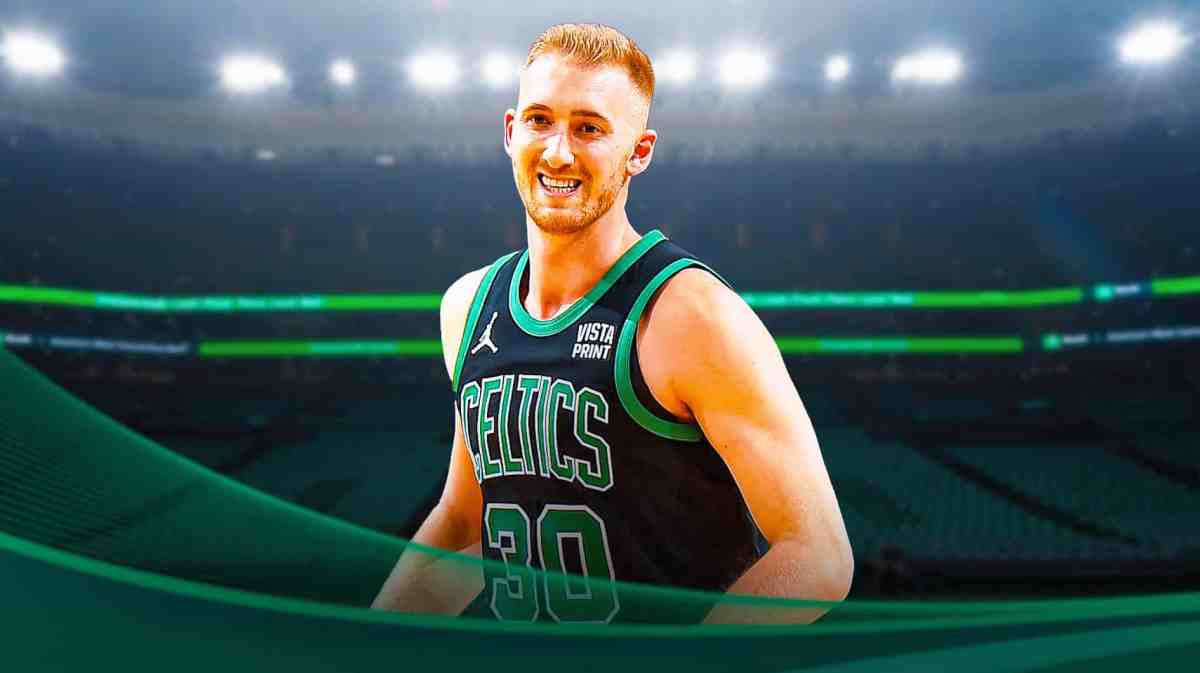 Sam Hauser looking happy at a contract