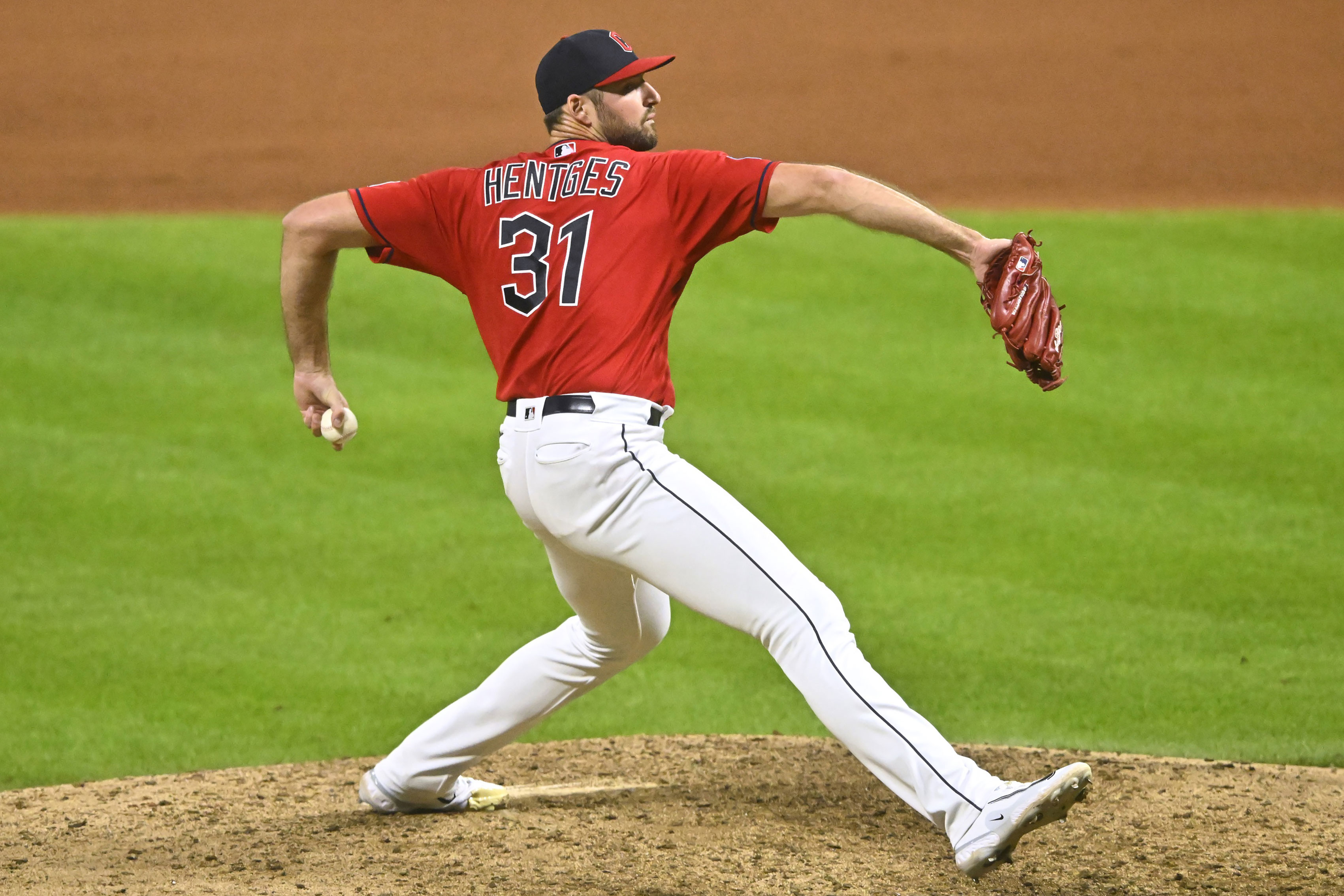 Sep 2, 2023; Cleveland, Ohio, USA; Cleveland Guardians relief pitcher Sam Hentges (31) delivers against the Tampa Bay Rays in the eleventh inning at Progressive Field. 