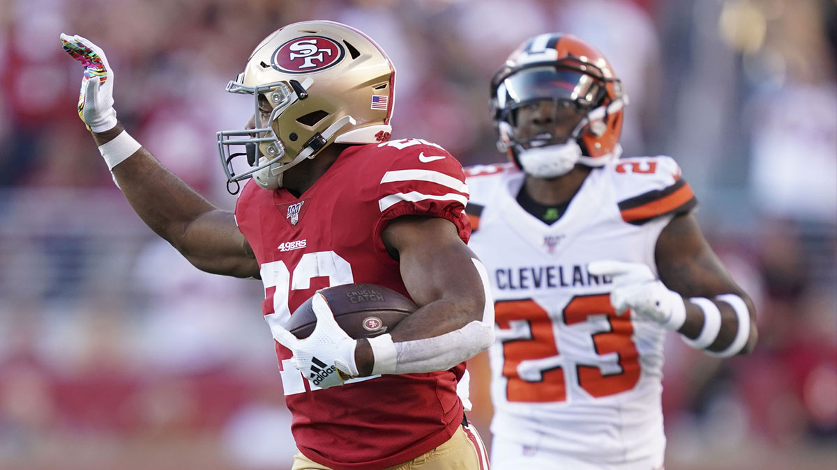 San Francisco 49ers running back Matt Breida (22) celebrates scoring a touchdown against Cleveland Browns strong safety Damarious Randall (23) during the first quarter at Levi s Stadium.