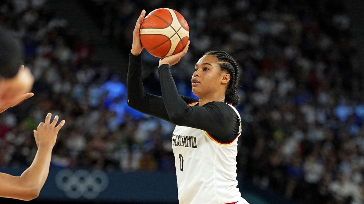 Germany forward Satou Sabally (0) shoots the ball against France in the women’s basketball quarterfinals during the Paris 2024 Olympic Summer Games at Accor Arena. 