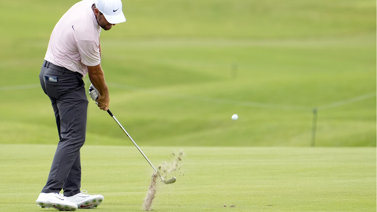 Scottie Scheffler plays his shot from the third fairway during the second round of the TOUR Championship golf tournament