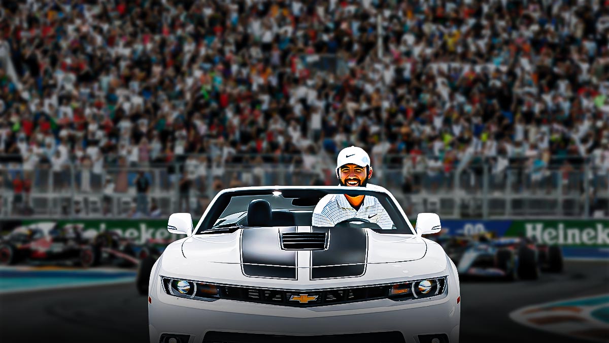 scottie scheffler in a car leaving field in the dust