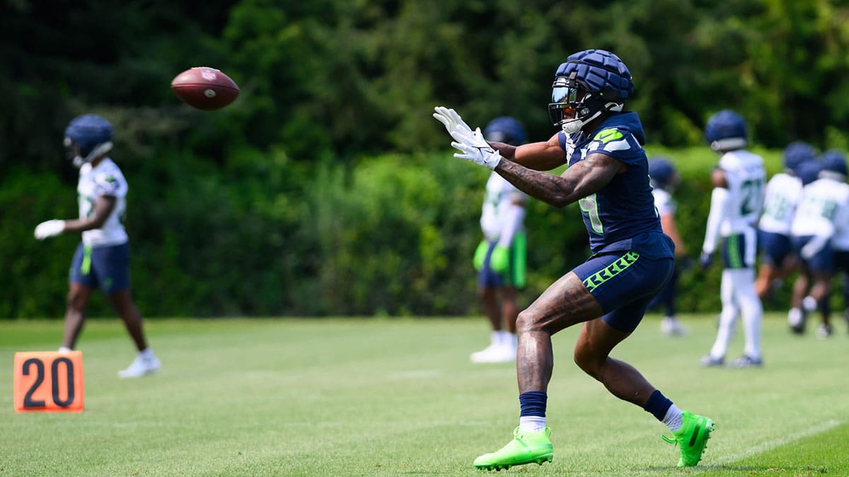  Seattle Seahawks wide receiver DK Metcalf (14) catches a pass during training camp at Virginia Mason Athletic Center. 