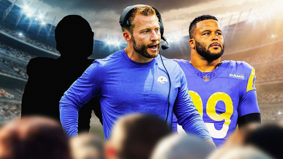 Sean McVay in the middle, Aaron Donald on the right, and the blacked-out silhouette of Kobie Turner on the right.