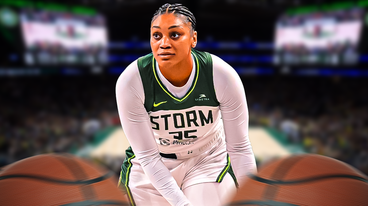 Seattle Storm player Victoria Vivians with the Seattle Storm arena in the background