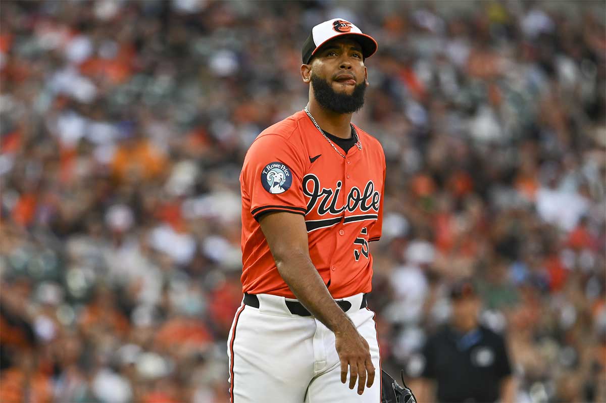 Baltimore Orioles relief pitcher Seranthony Dominguez (56) reacts after throwing as pitch in the ninth inning against the Houston Astros at Oriole Park at Camden Yards.