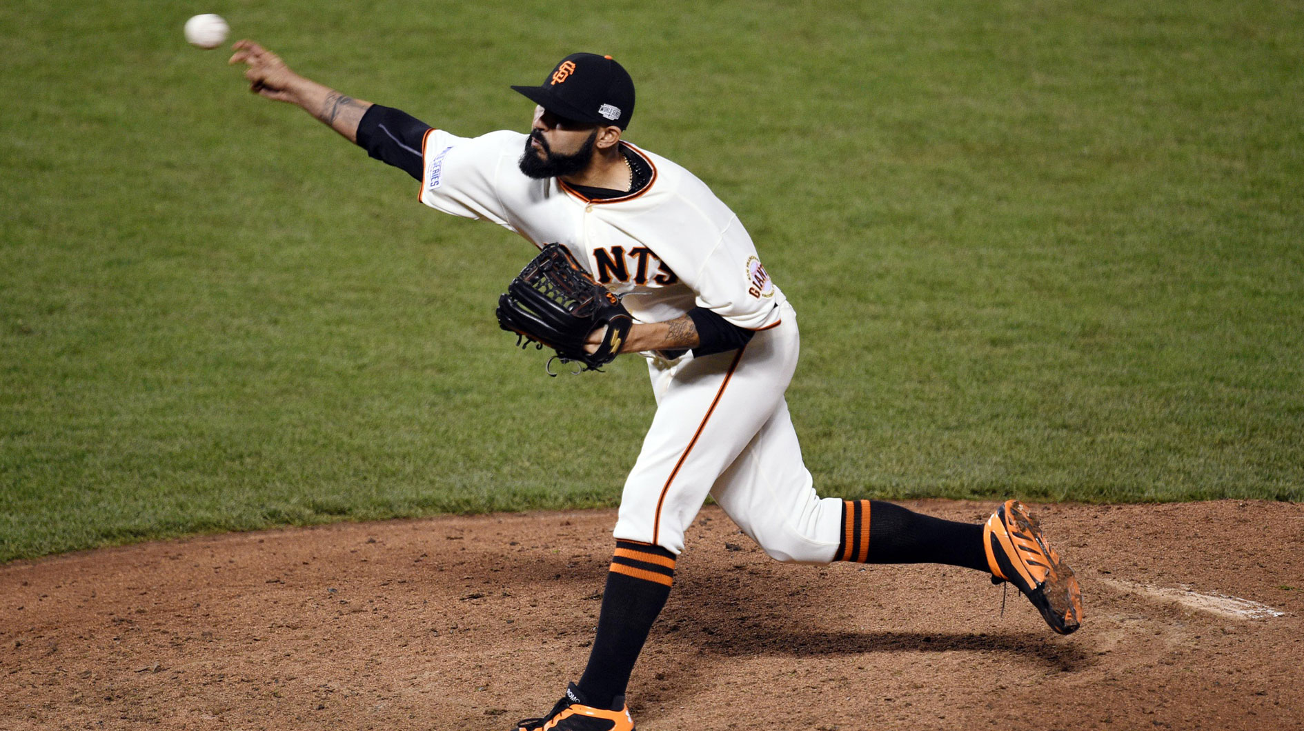 Oct 25, 2014; San Francisco, CA, USA; San Francisco Giants relief pitcher Sergio Romo throws a pitch against the Kansas City Royals in the 8th inning during game four of the 2014 World Series at AT&T Park.