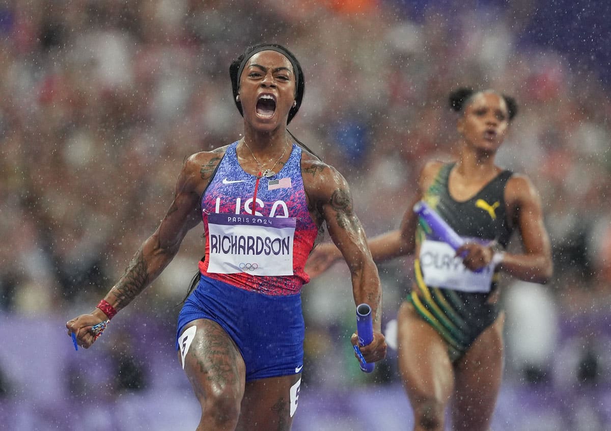 Sha'carri Richardson (USA) celebrates after winning in the women's 4x100m relay final during the Paris 2024 Olympic Summer Games.