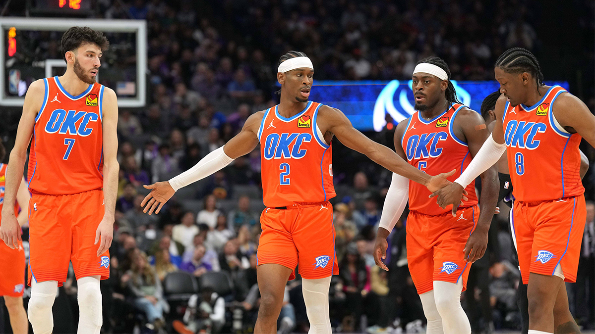 Oklahoma City Thunder guard Shai Gilgeous-Alexander (2) walks to the bench with forwards Chet Holmgren (7) and Jalen Williams (8) and guard Luguentz Dort (second from right) during the fourth quarter against the Sacramento Kings at Golden 1 Center.