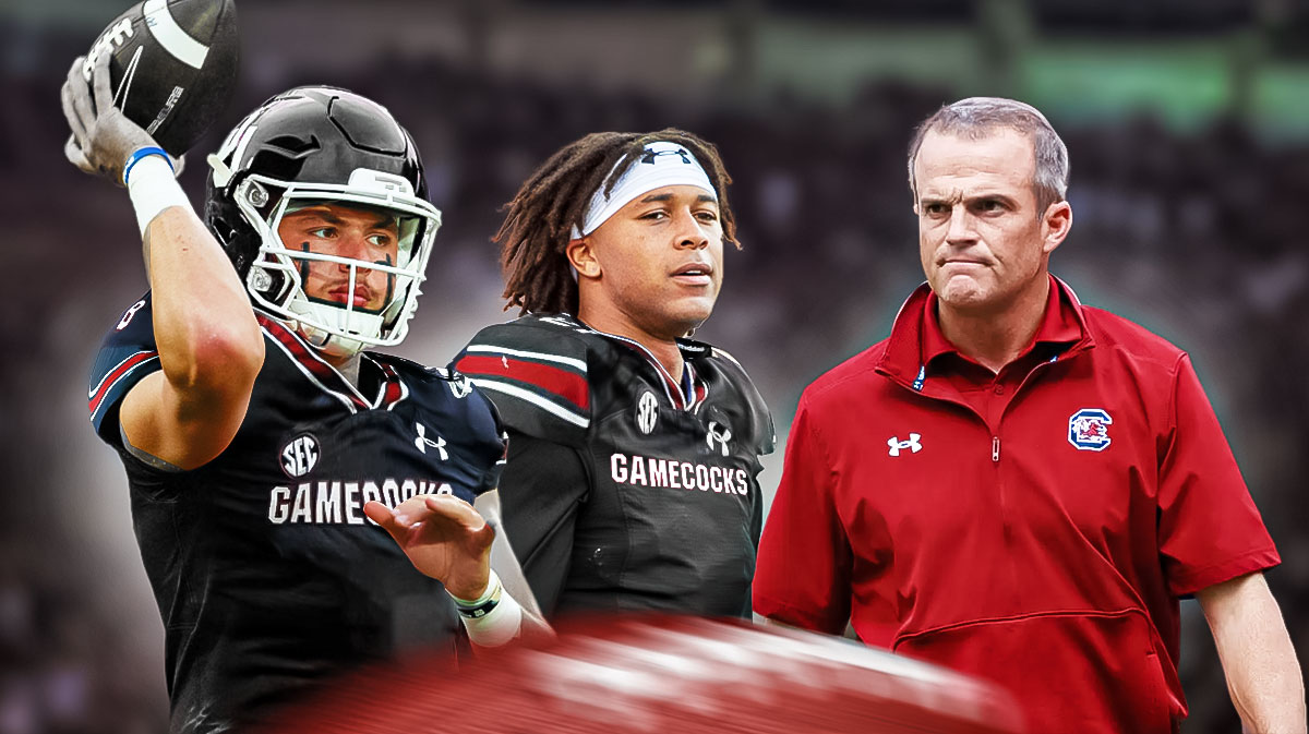 South Carolina football coach Shane Beamer looking at LaNorris Sellers and Robby Ashford.