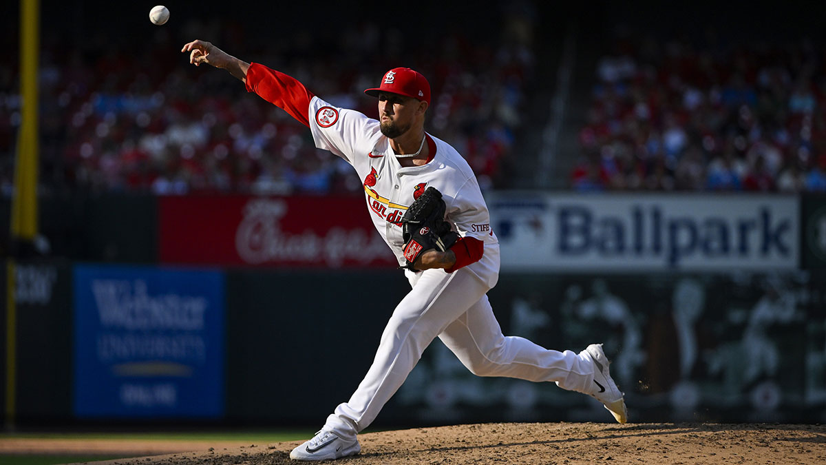 Aug 5, 2024; St. Louis, Missouri, USA; St. Louis Cardinals relief pitcher Shawn Armstrong (30) pitches against the New York Mets during the sixth inning at Busch Stadium.
