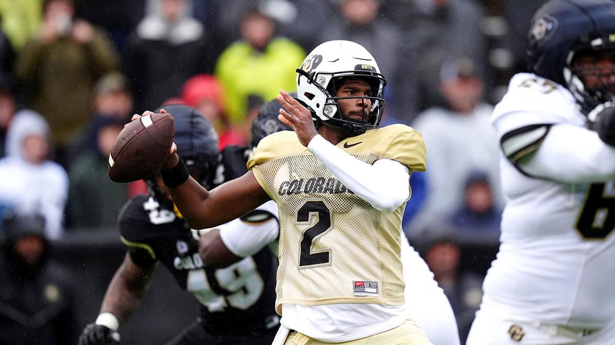  Colorado Buffaloes quarterback Shedeur Sanders (2) prepares to pass during a spring game event at Folsom Field.