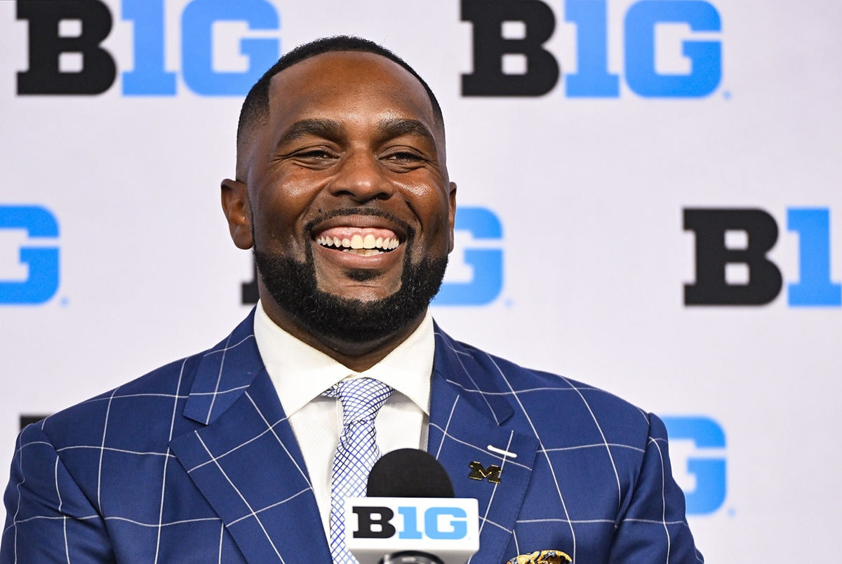 Michigan Wolverines head coach Sherrone Moore speaks to the media during the Big 10 football media day at Lucas Oil Stadium.