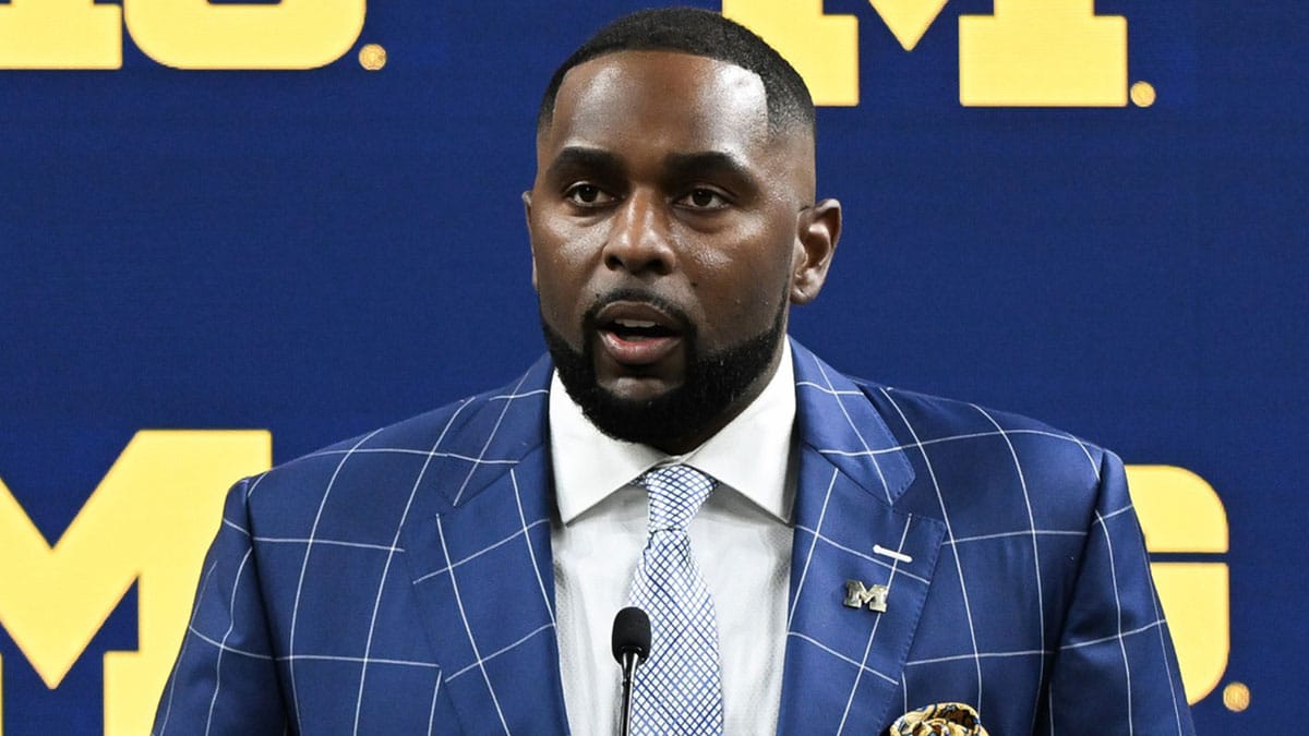 Michigan Wolverines head coach Sherrone Moore speaks to the media during the Big 10 football media day at Lucas Oil Stadium.