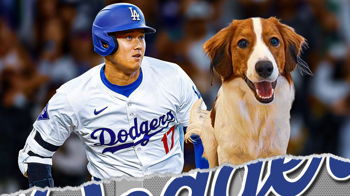 Shohei Ohtani in a Los Angeles Dodgers uniform with his dog Decoy as the pair will be featured in a bobblehead giveaway by the Dodgers.