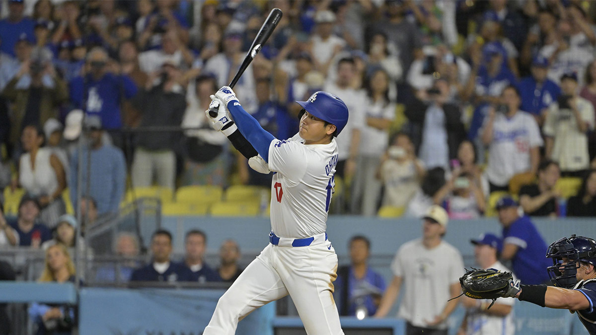 Los Angeles Dodgers designated hitter Shohei Ohtani (17) hits a walk-off grand slam home run, his 40th of the season, in the ninth inning against the Tampa Bay Rays at Dodger Stadium.