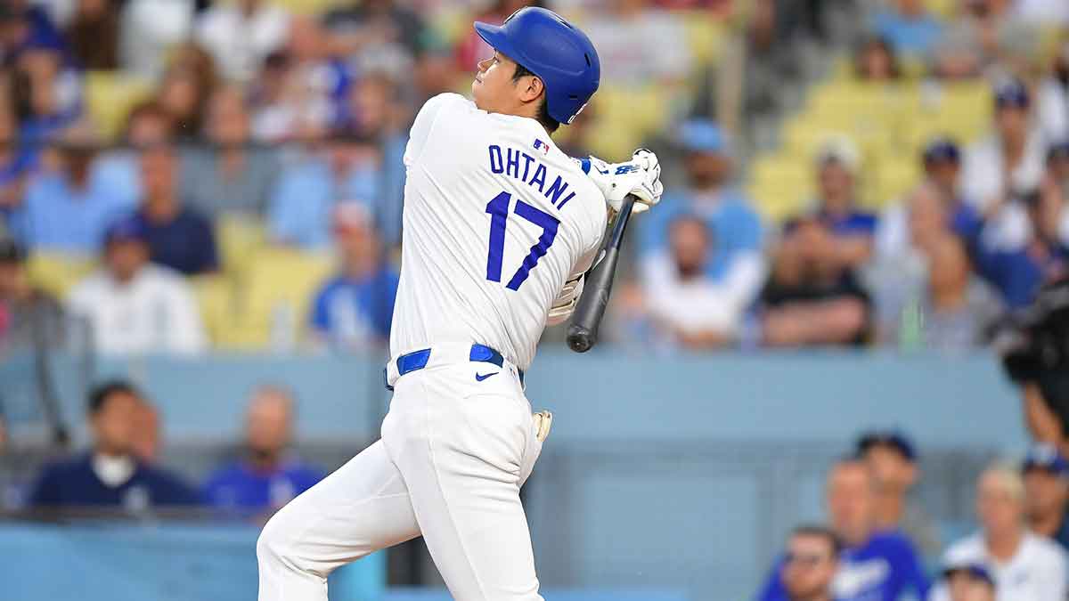 Aug 27, 2024; Los Angeles, California, USA; Los Angeles Dodgers designated hitter Shohei Ohtani (17) hits a single against the Baltimore Orioles during the first inning at Dodger Stadium.