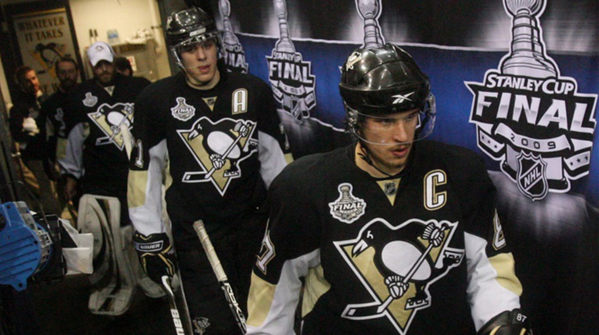 Pittsburgh Penguins center Sidney Crosby (87) leads center Evgeni Malkin (A) and his team out for the third period of game six of the 2009 Stanley Cup Finals against the Detroit Red Wings at Mellon Arena.