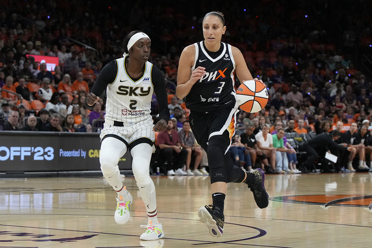 
May 21, 2023; Phoenix, Arizona, USA; Phoenix Mercury guard Diana Taurasi (3) moves the ball against Chicago Sky guard Kahleah Copper (2) in the first half at Footprint Center.