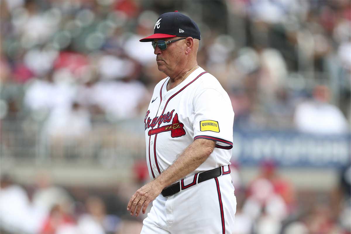 Atlanta Braves manager Brian Snitker (43) walks off the mound in a game against the Miami Marlins in the forth inning at Truist Park.