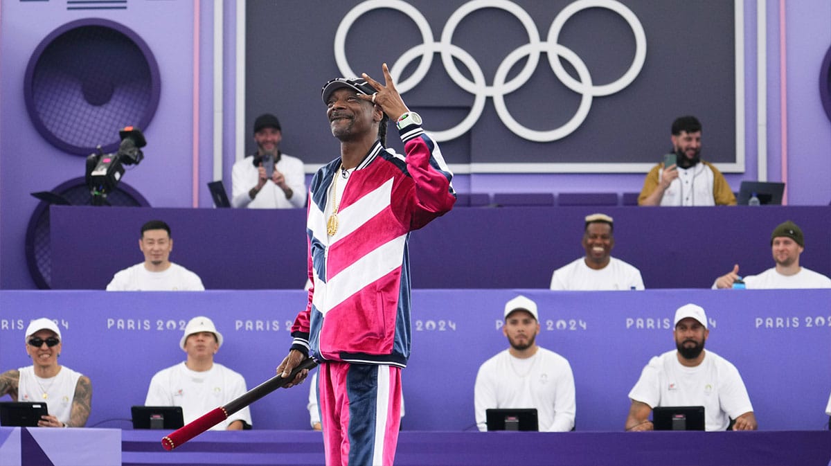 Snoop Dogg marks the start of the breaking B-Girls round robin competition during the Paris 2024 Olympic Summer Games at La Concorde.