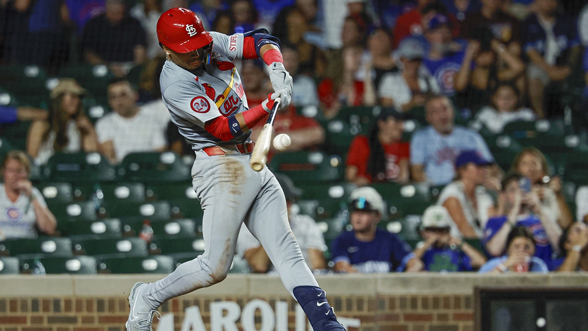 St. Louis Cardinals shortstop Masyn Winn (0) hits a two-run home run against the Chicago Cubs during the seventh inning at Wrigley Field. 