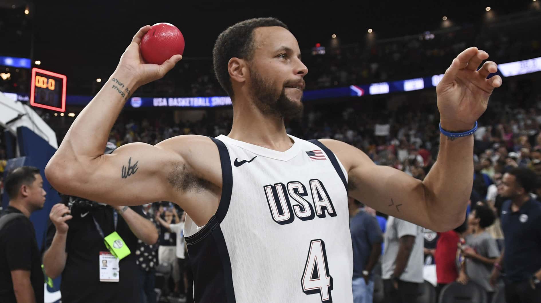 USA guard Steph Curry (4) throws a ball to the fans after defeating Canada in the USA Basketball Showcase at T-Mobile Arena. 