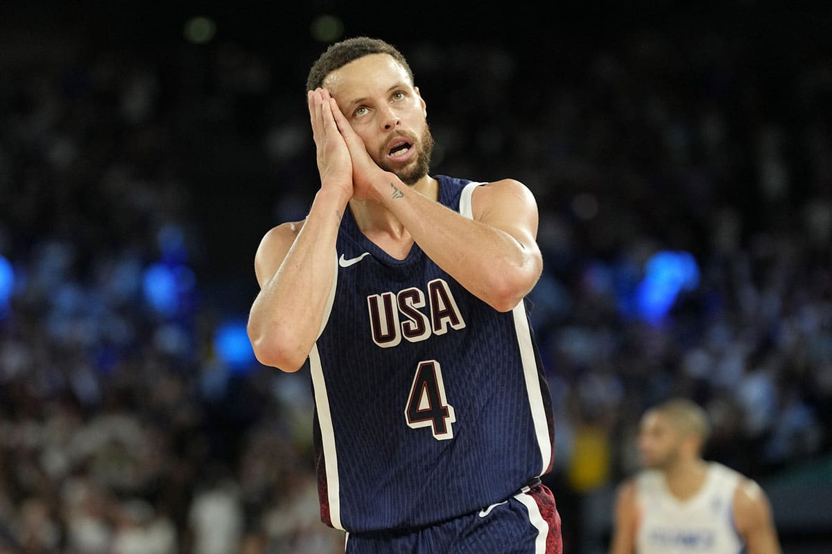 United States shooting guard Stephen Curry (4) reacts in the second half against France in the men's basketball gold medal game during the Paris 2024 Olympic Summer Games at Accor Arena.