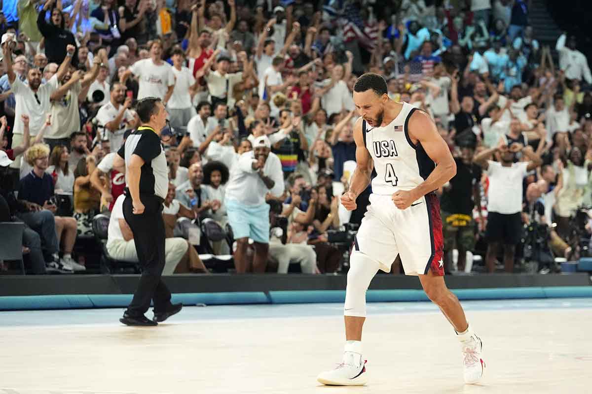 United States shooting guard Stephen Curry (4) celebrates during the second half against Serbia in a men's basketball semifinal game during the Paris 2024 Olympic Summer Games at Accor Arena